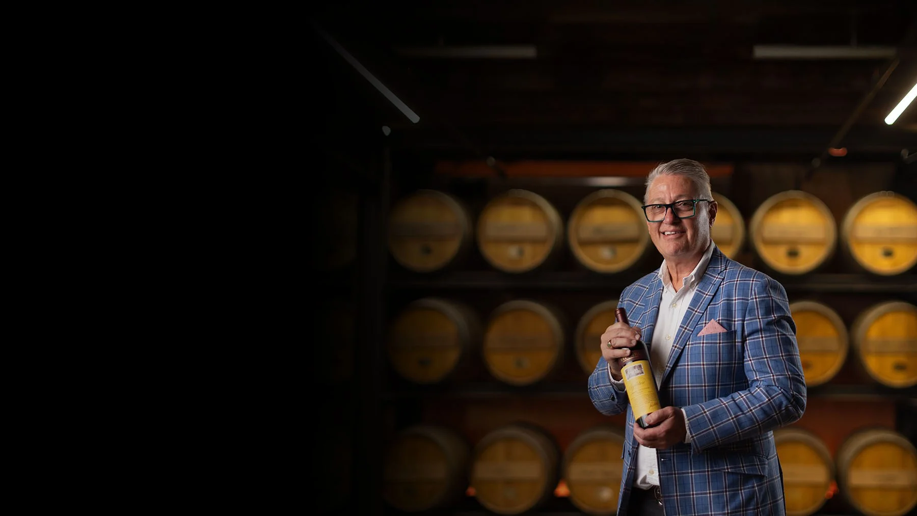 2022 Signature wine being held by the Signatory