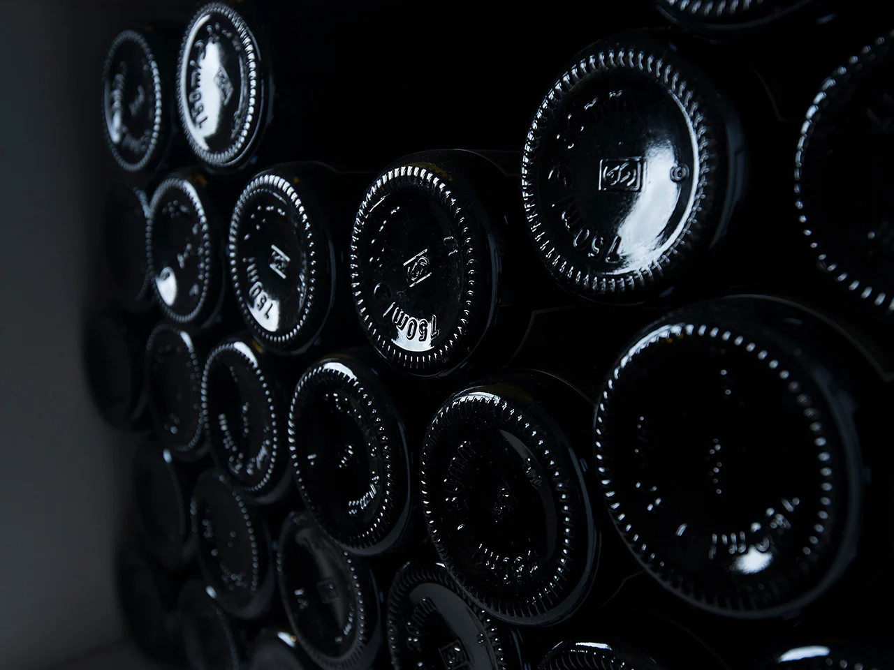 An image from inside the special cellar with wine bottles stored along all walls