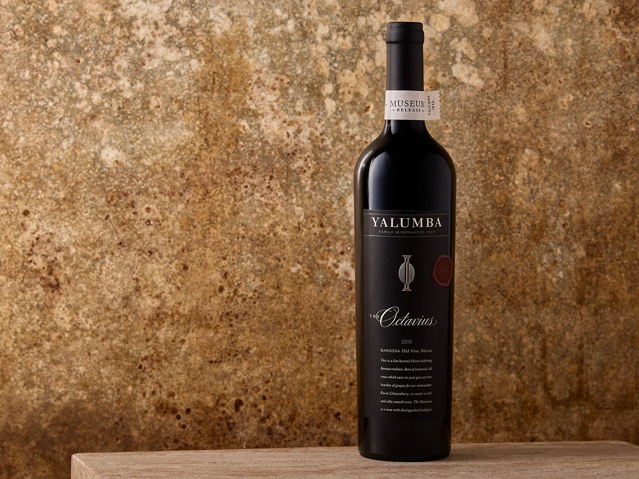 The Octavius Shiraz bottle sits on a wooden benchtop