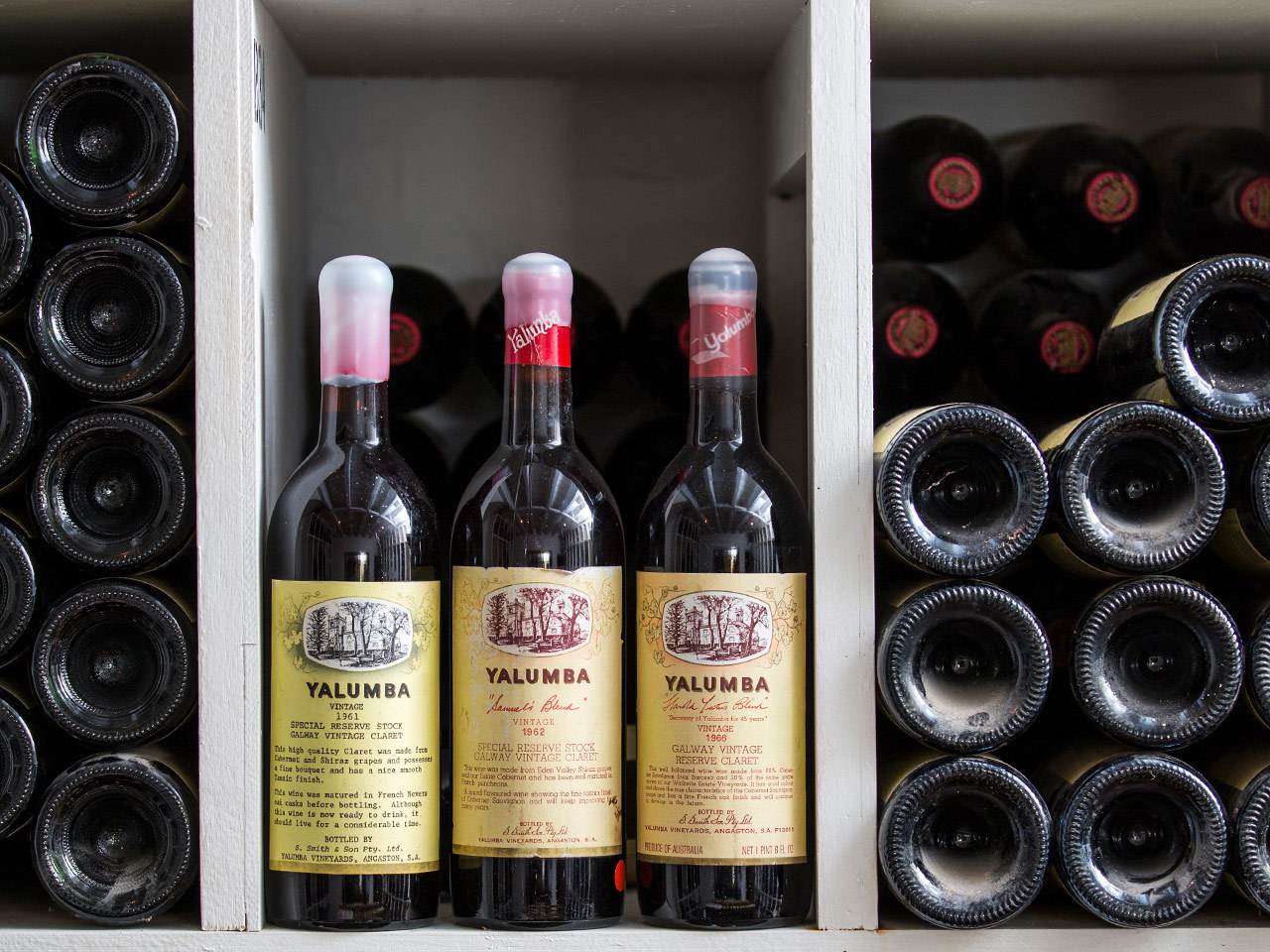 Vintage Yalumba wine bottles in cellar storage
