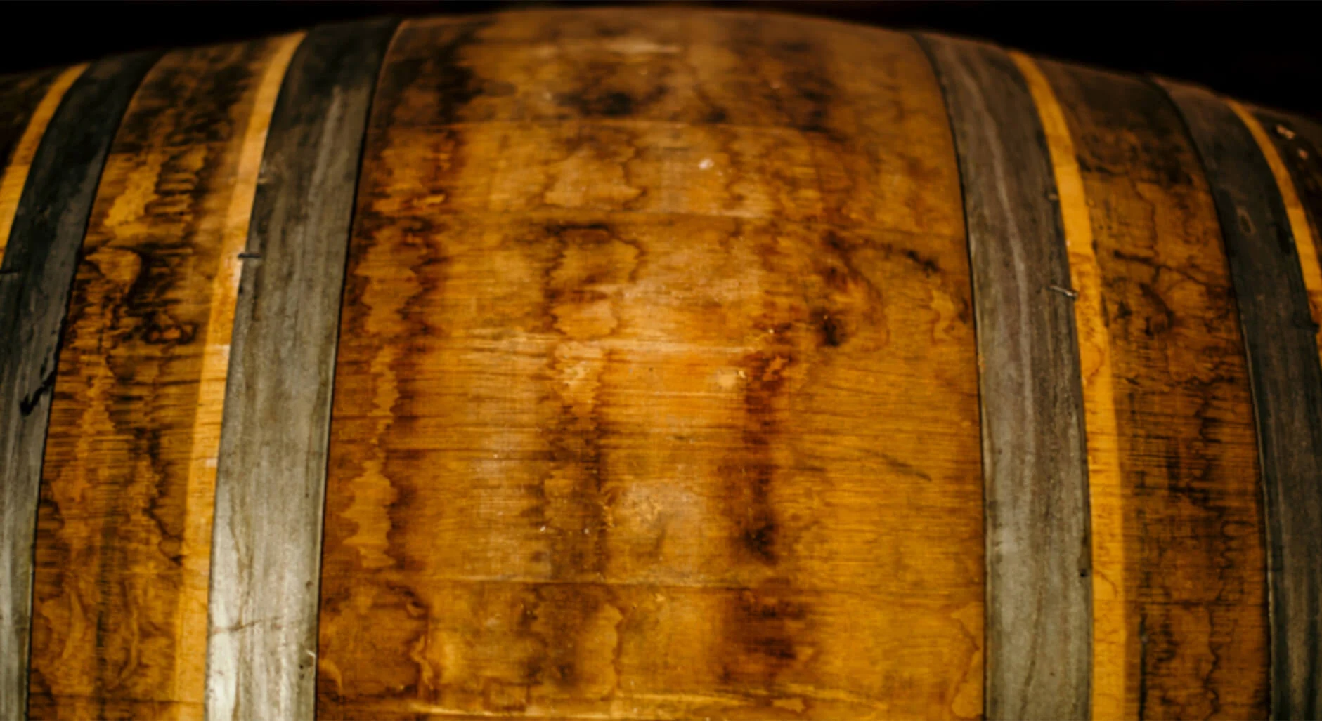 A close up image of a wine barrel